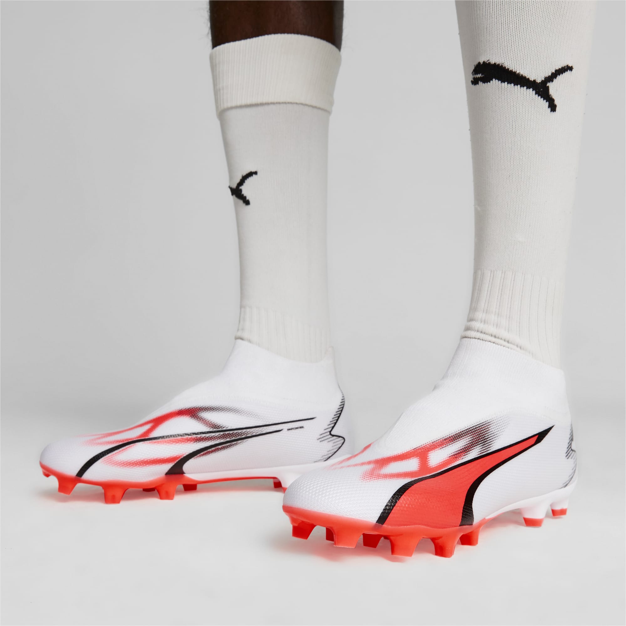 PUMA Chaussures De Football Sans Lacets ULTRA MATCH+ FG/AG Pour Homme, Blanc/Rose/Noir