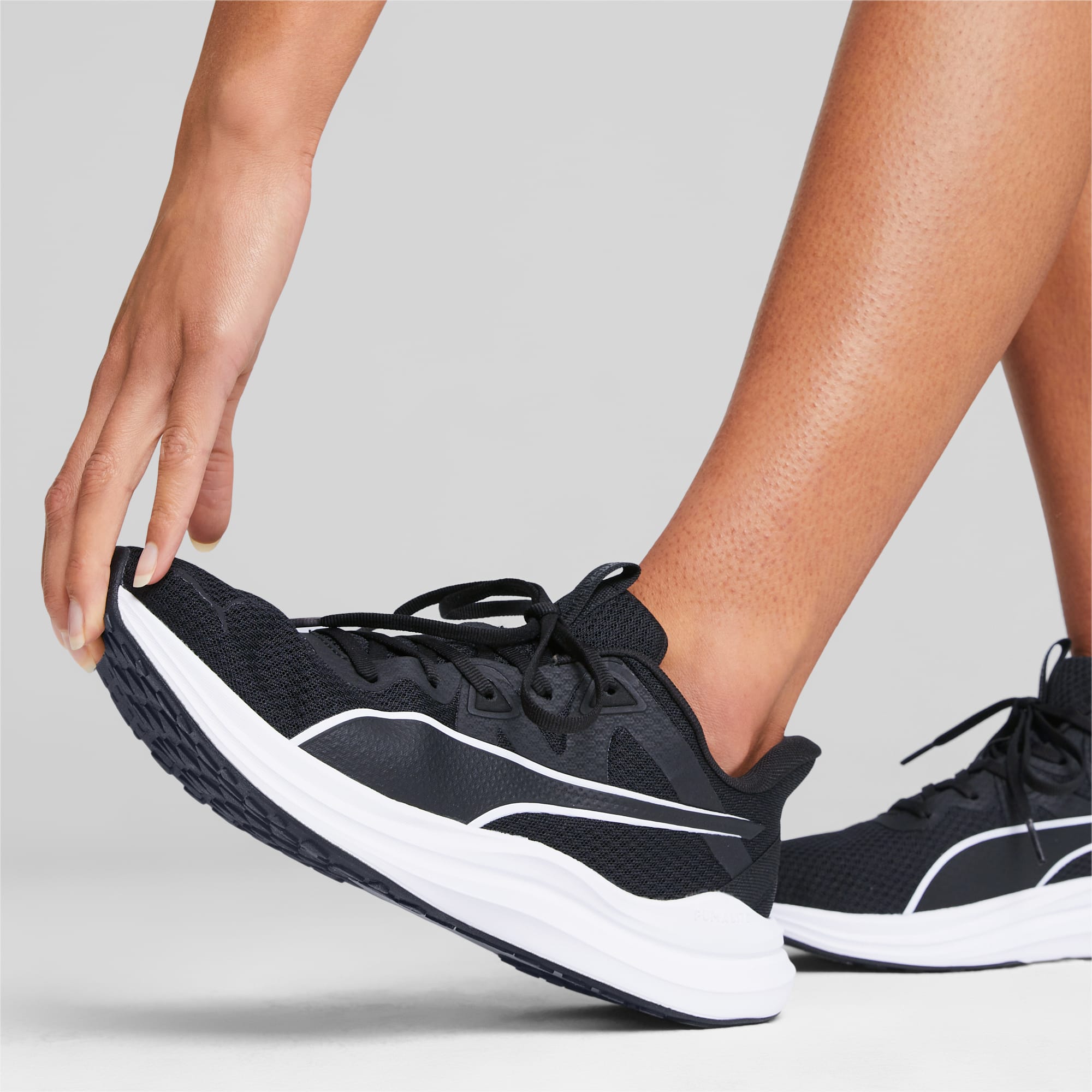PUMA Chaussures De Running Reflect Lite, Noir/Blanc