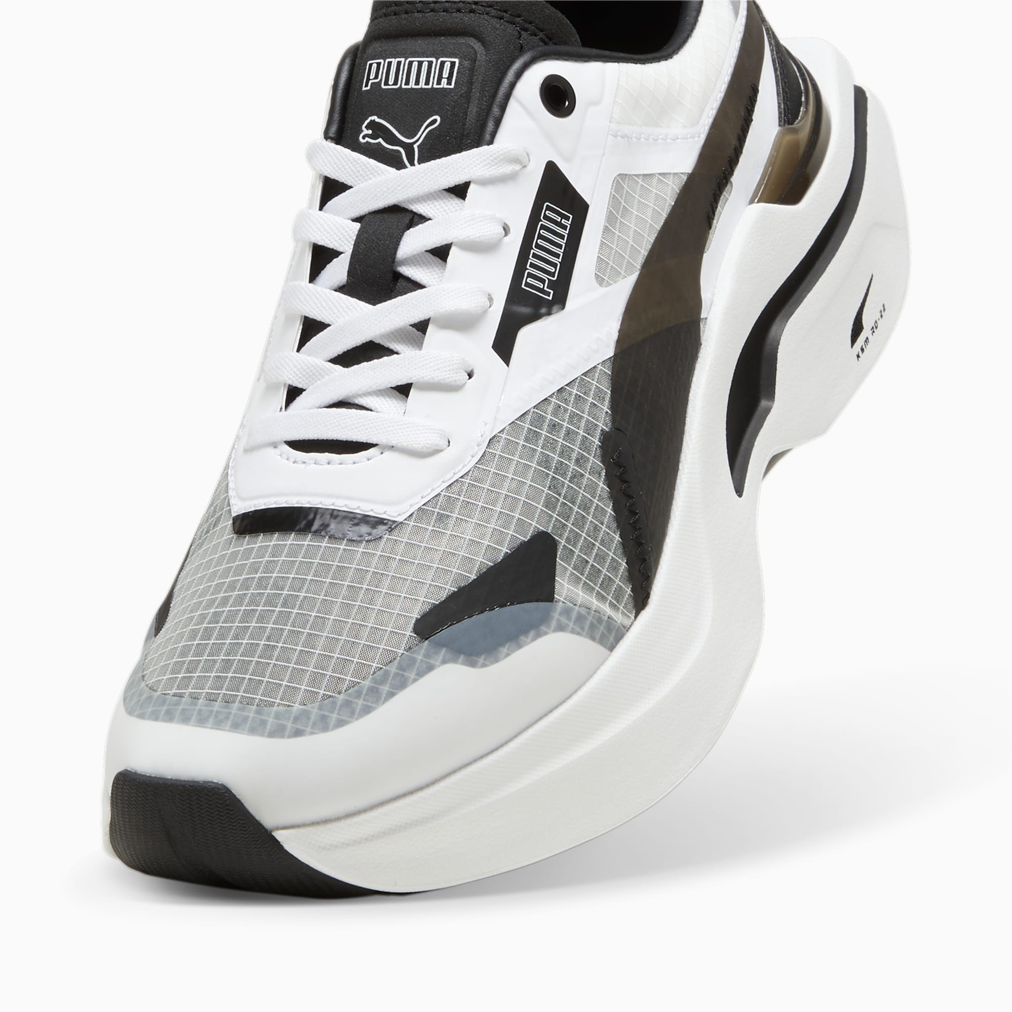 PUMA Kosmo Rider sportschoenen, Wit/Zwart