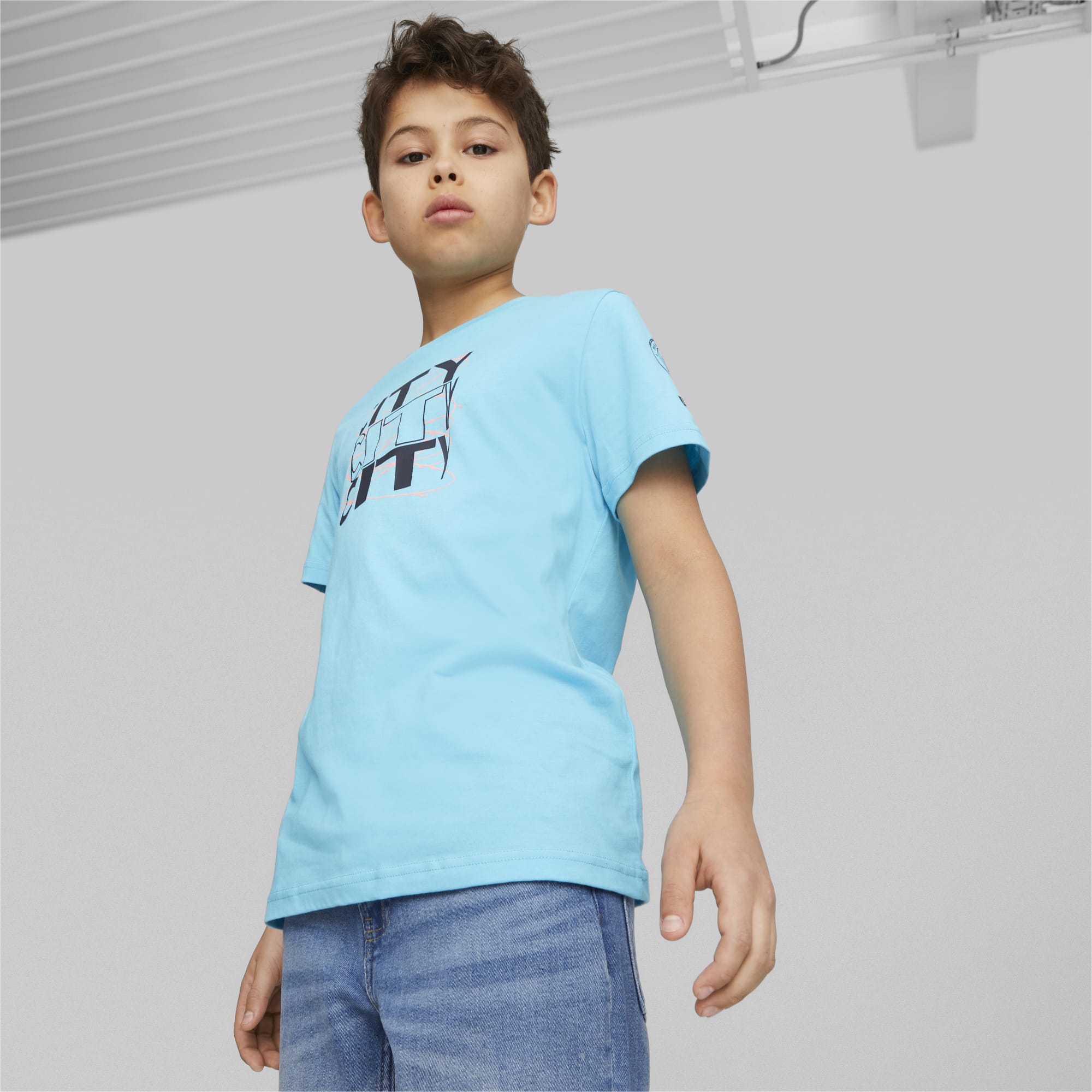 PUMA Manchester City Ftblcore Youth Graphic T-Shirt, Dark Blue
