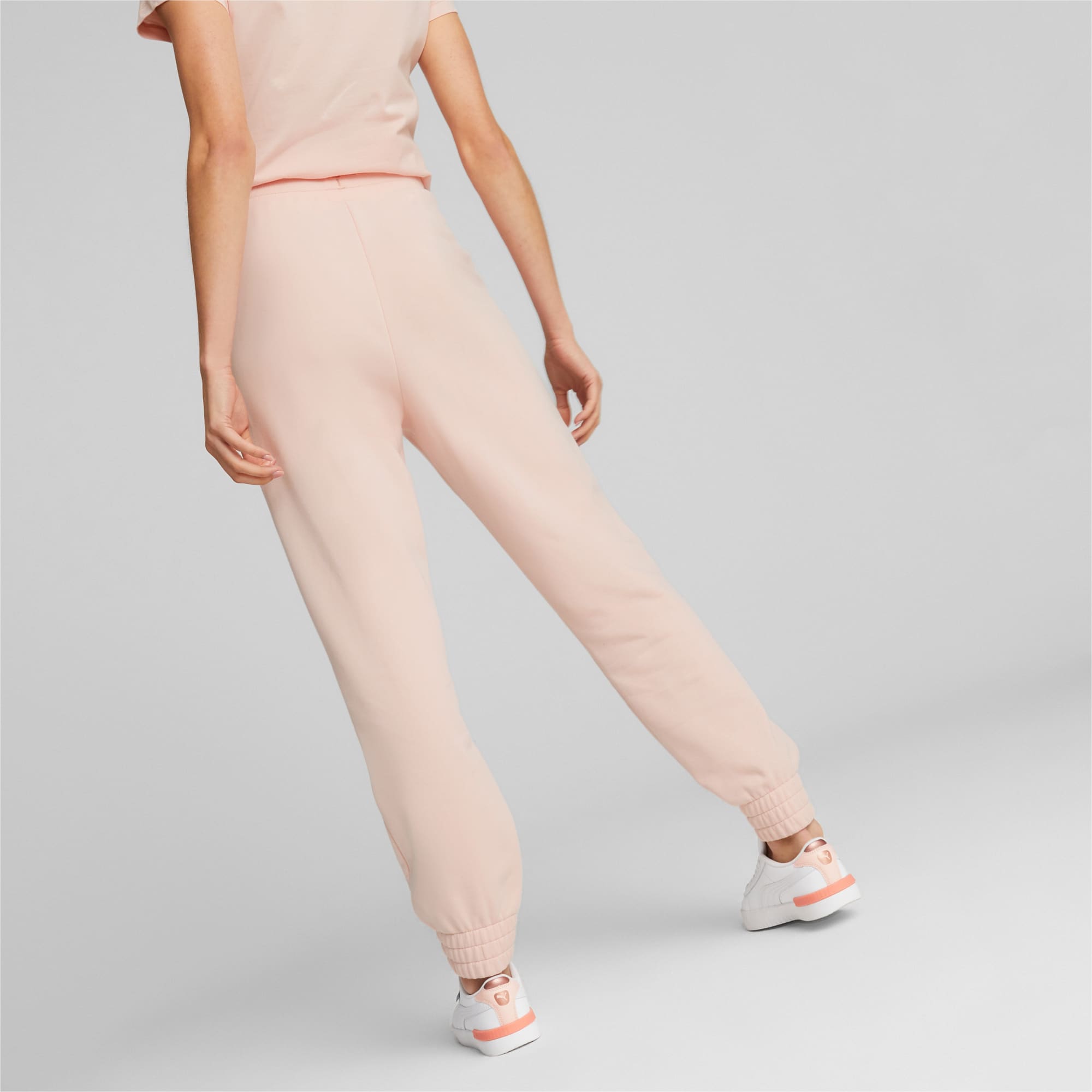 PUMA Pantalon Essentials+ Embroidery Femme, Rose