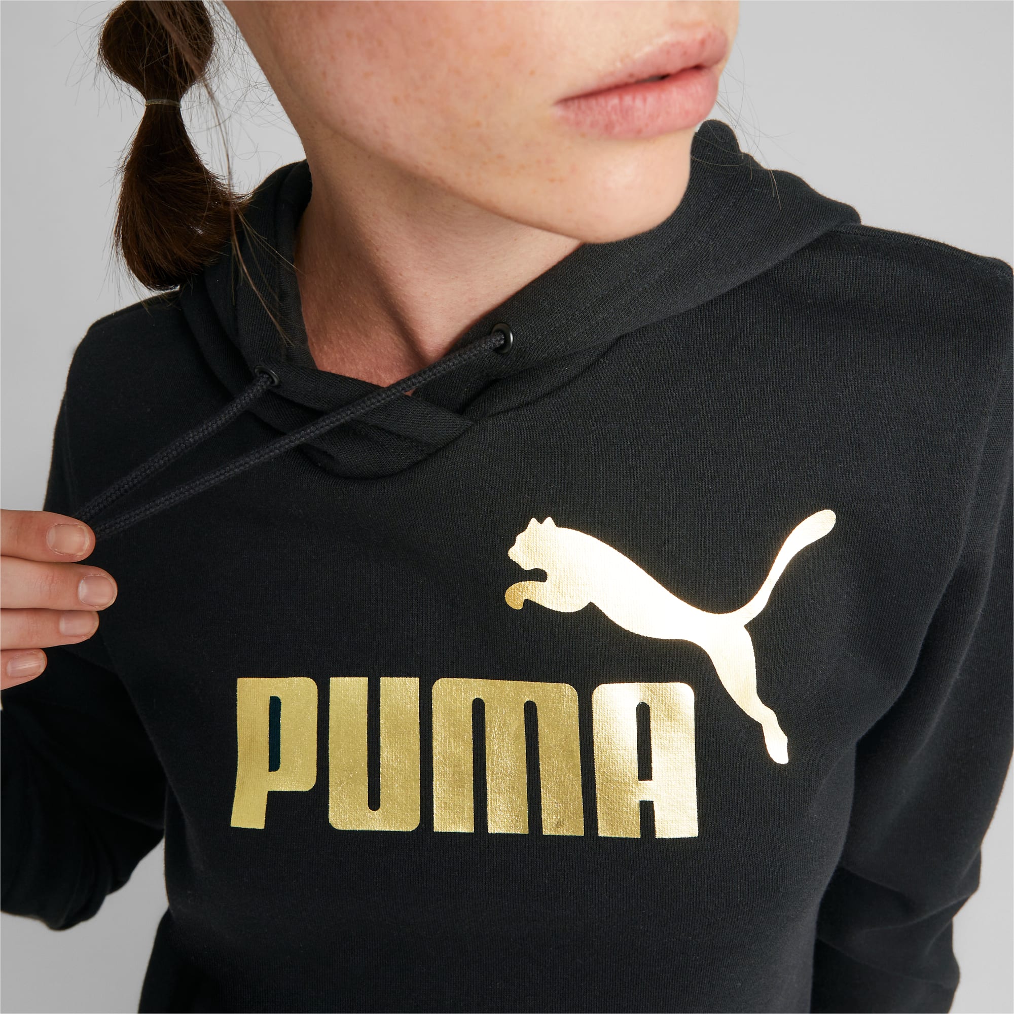 PUMA Sweat à Capuche Essentials+ Metallic Logo Femme, Noir/Or