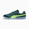 Grüne PUMA-Turnschuhe mit Limettenstreifen, dunkler Zehe und durchscheinender Sohle.