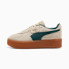 Scarpe da ginnastica PUMA beige da adulto, con striscia verde e suola marrone.