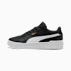 Basket PUMA noire pour femme avec bande blanche et épaisse semelle blanche.