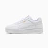 White PUMA trainers for adults with gold logo and lace-up fastening.