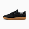 Basket noire PUMA Palermo homme avec semelle en caoutchouc marron.