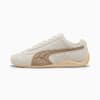 Crème PUMA damesschoen met een bruine formstrip aan de zijkant.