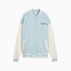 Light blue PUMA jacket for women with white sleeves and button closure.