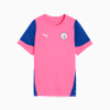 Pink PUMA kids' T-shirt with blue sleeves and Manchester City badge.