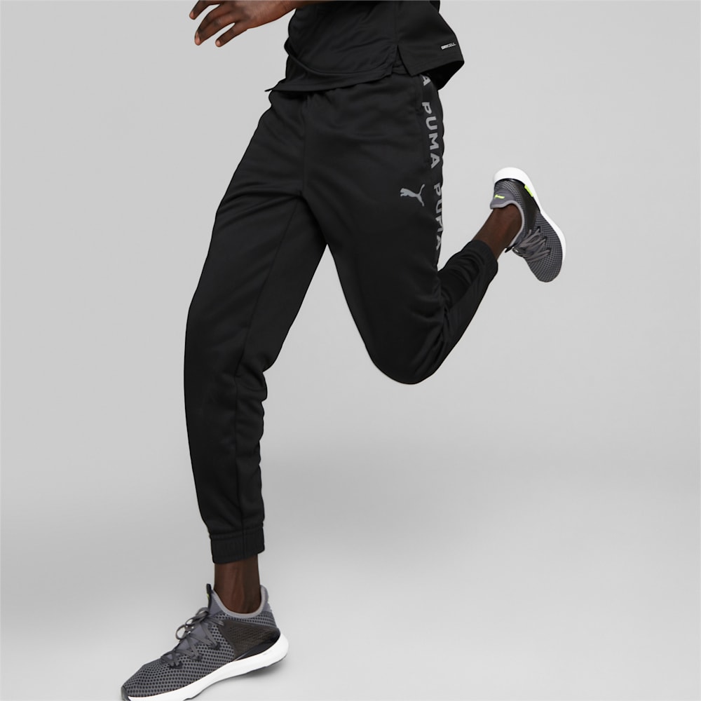 Puma solid men's black track pants best sale