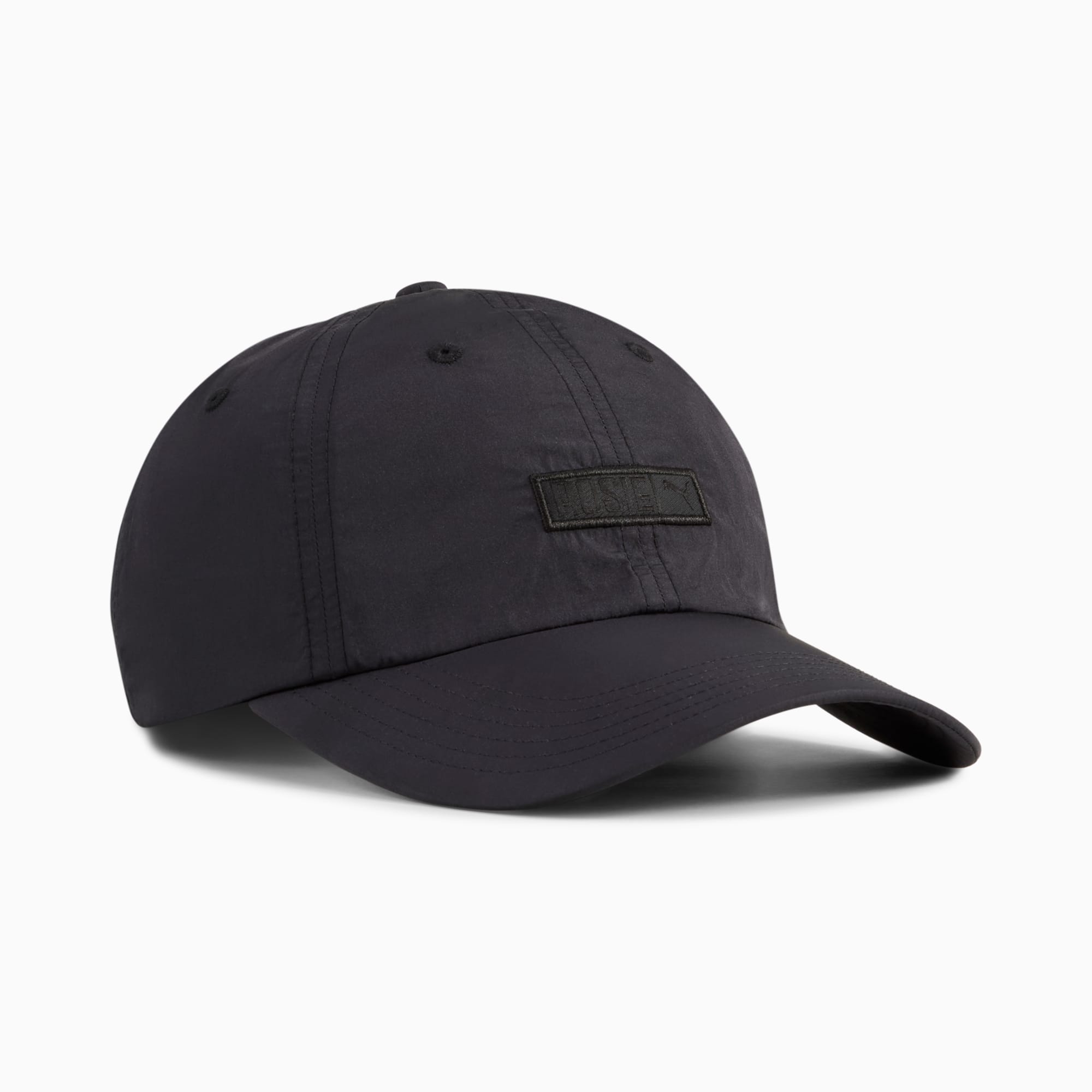 Cappellino PUMA nero da adulto con patch logo sul pannello frontale.