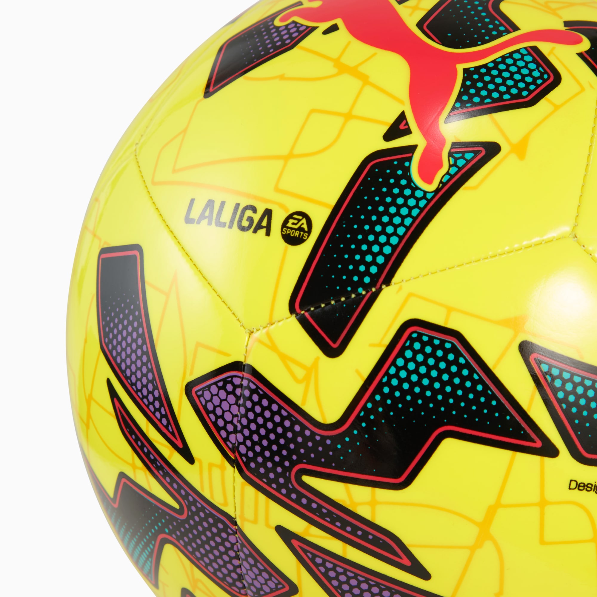 Yellow PUMA football with black, purple and teal geometric graphic elements.