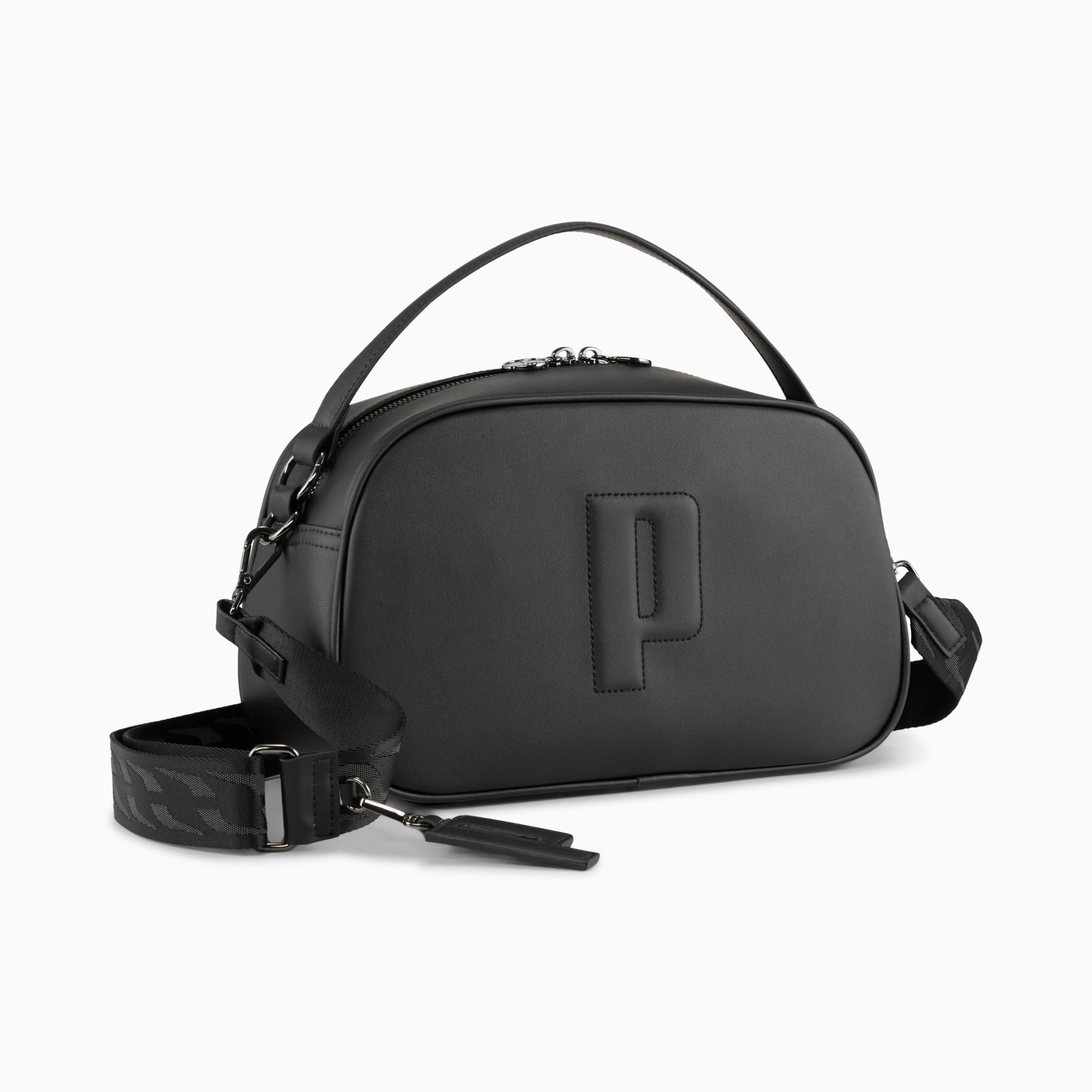 Zwarte PUMA barrel bag voor dames met handvat en afneembare schouderriem.
