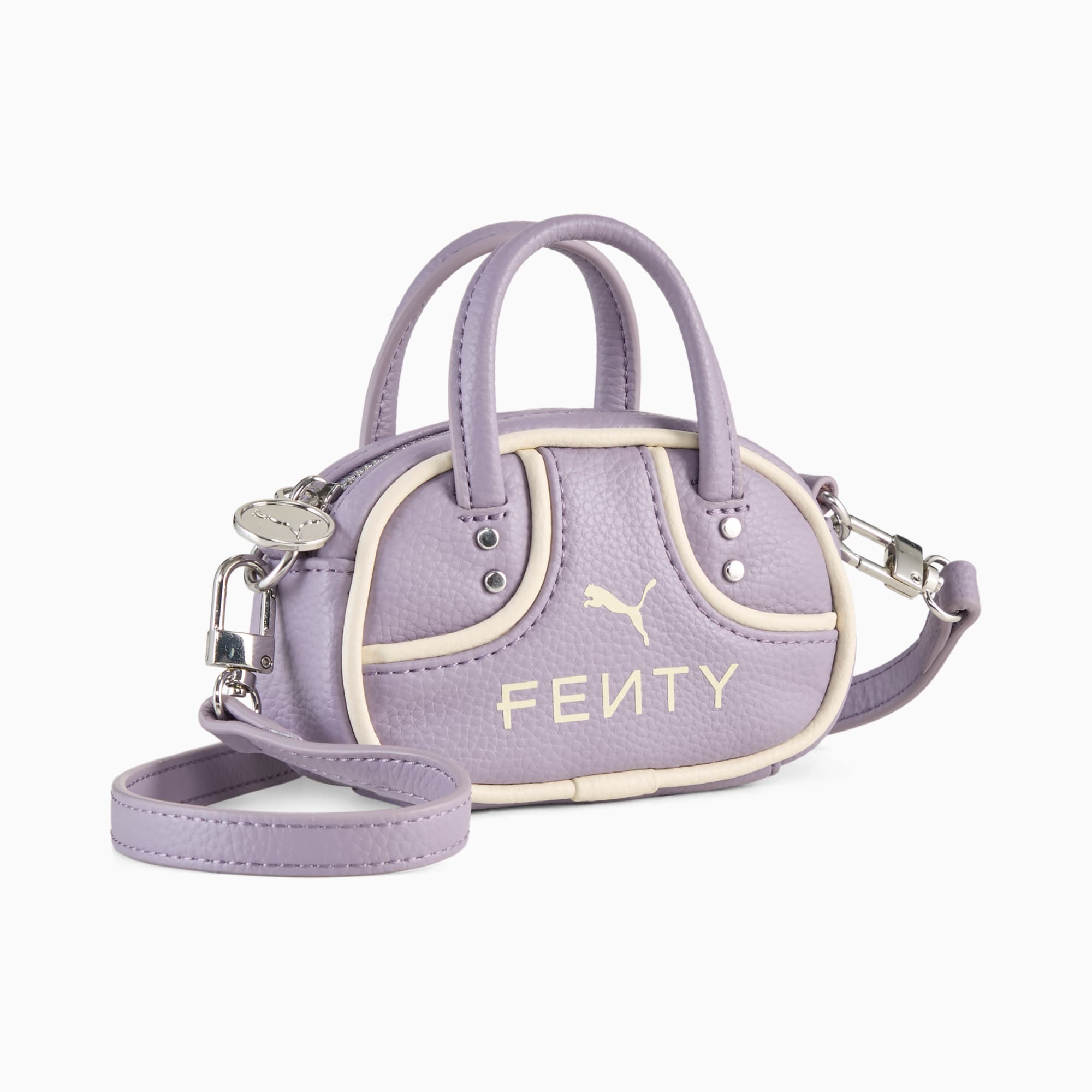 Lila PUMA FENTY handtas met handvatten, schouderriem en merkdetails.