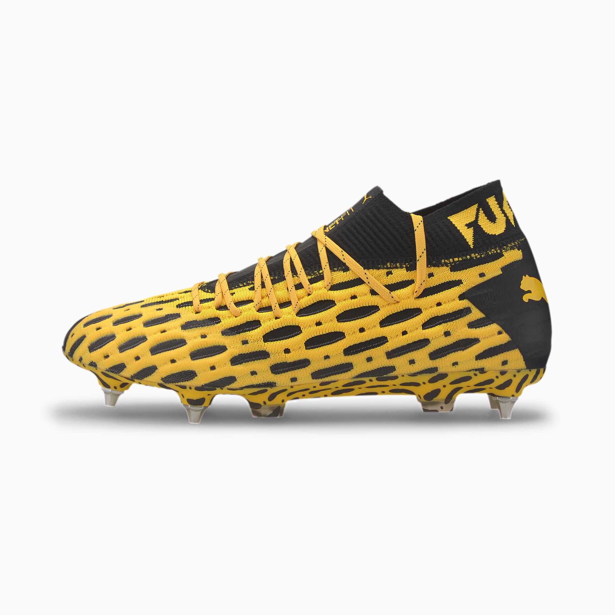 black and yellow puma football boots