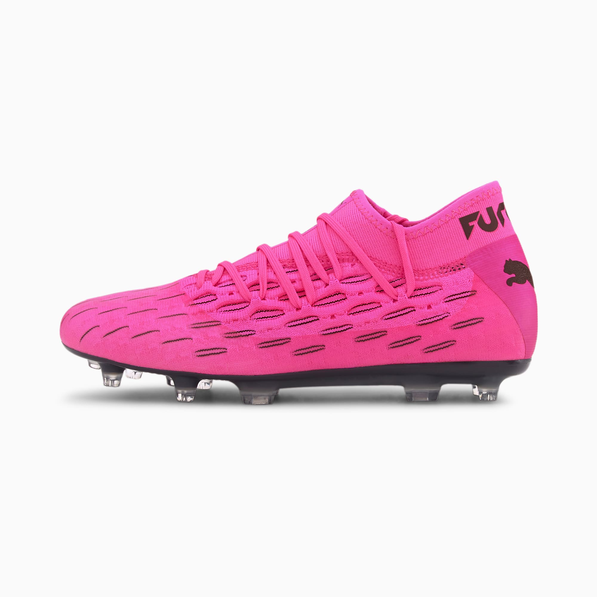 white and pink football boots