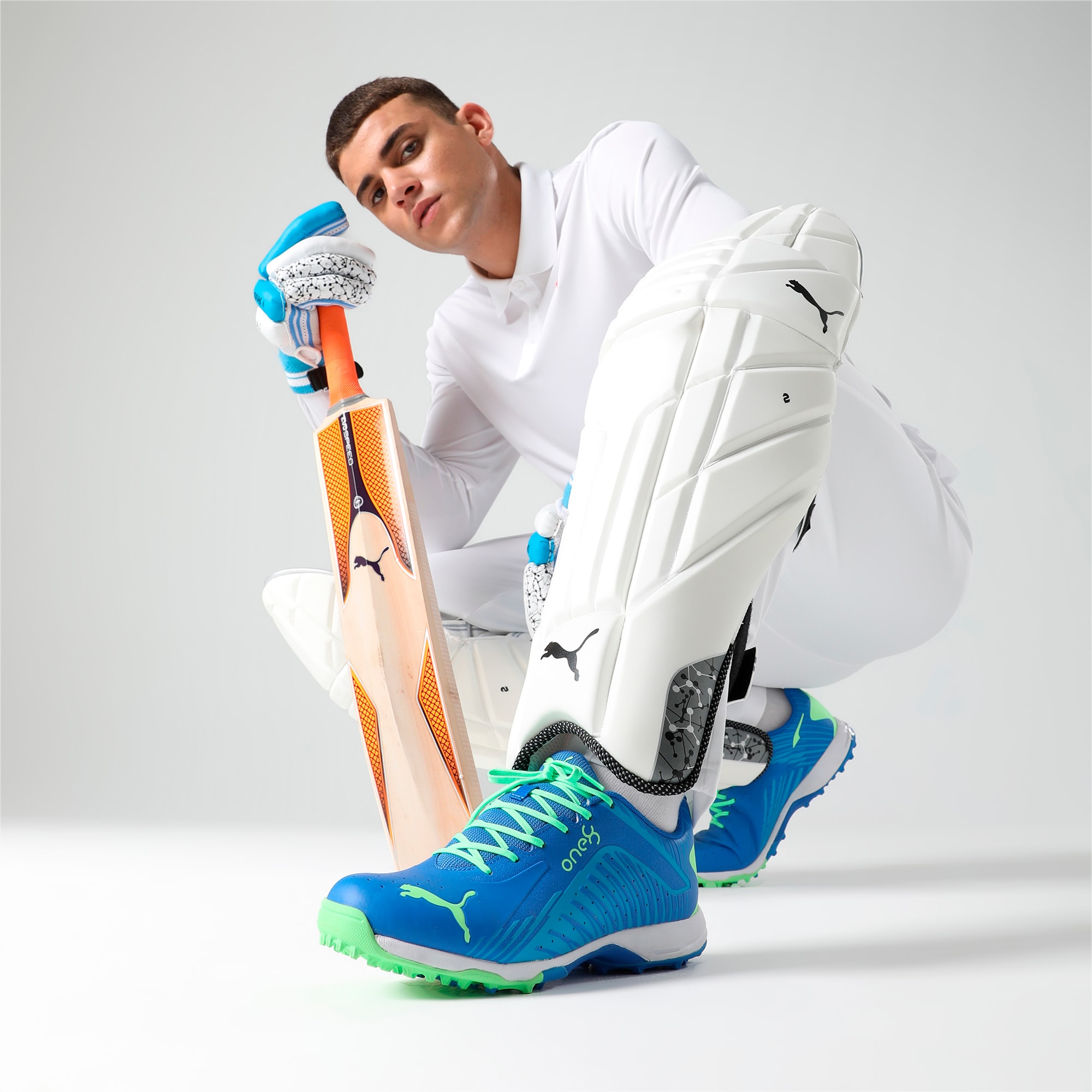 Puma one8 on sale cricket shoes gold