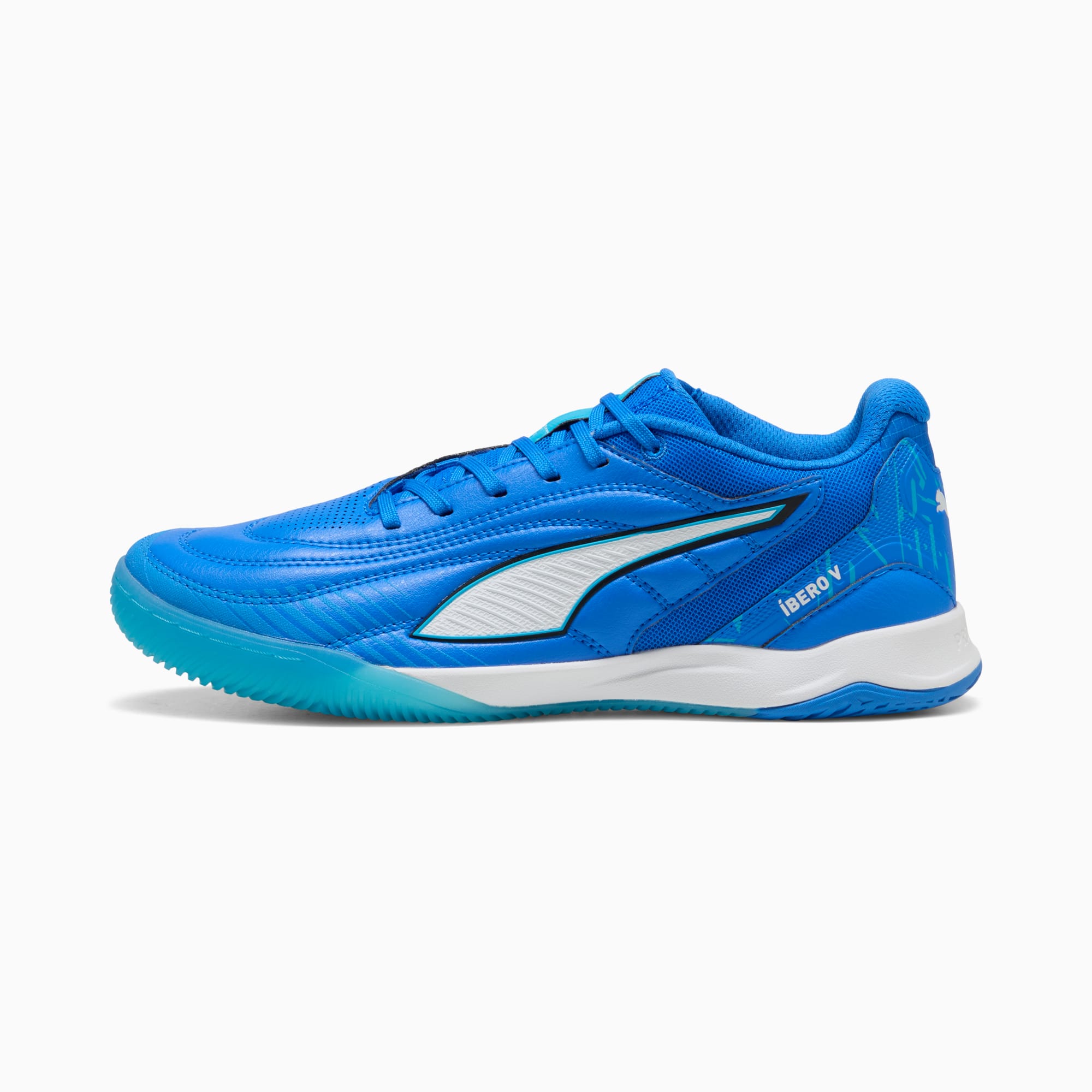 Chaussure de salle bleue PUMA pour jeunes avec bande blanche et texte 'Ibero V'.
