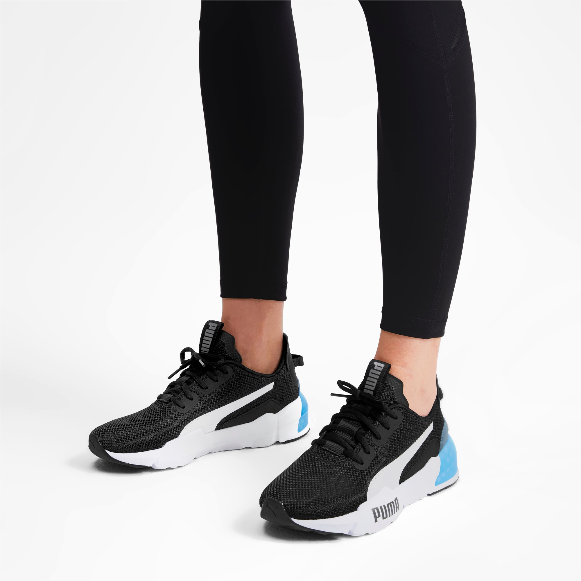 white and black adidas tennis shoes