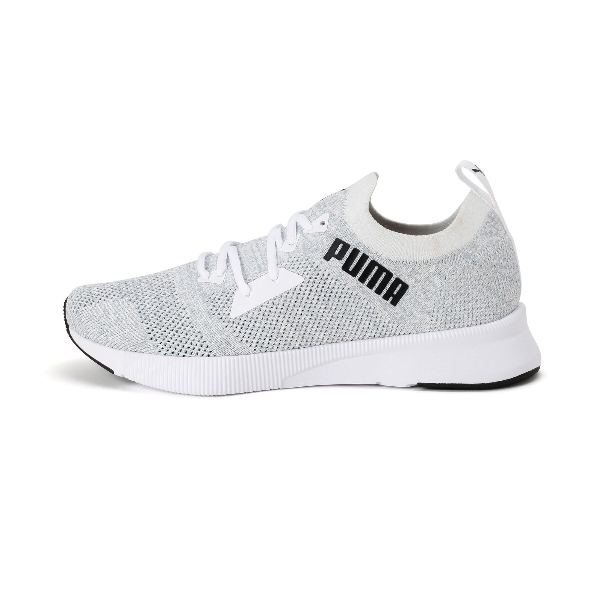 white puma sports shoes