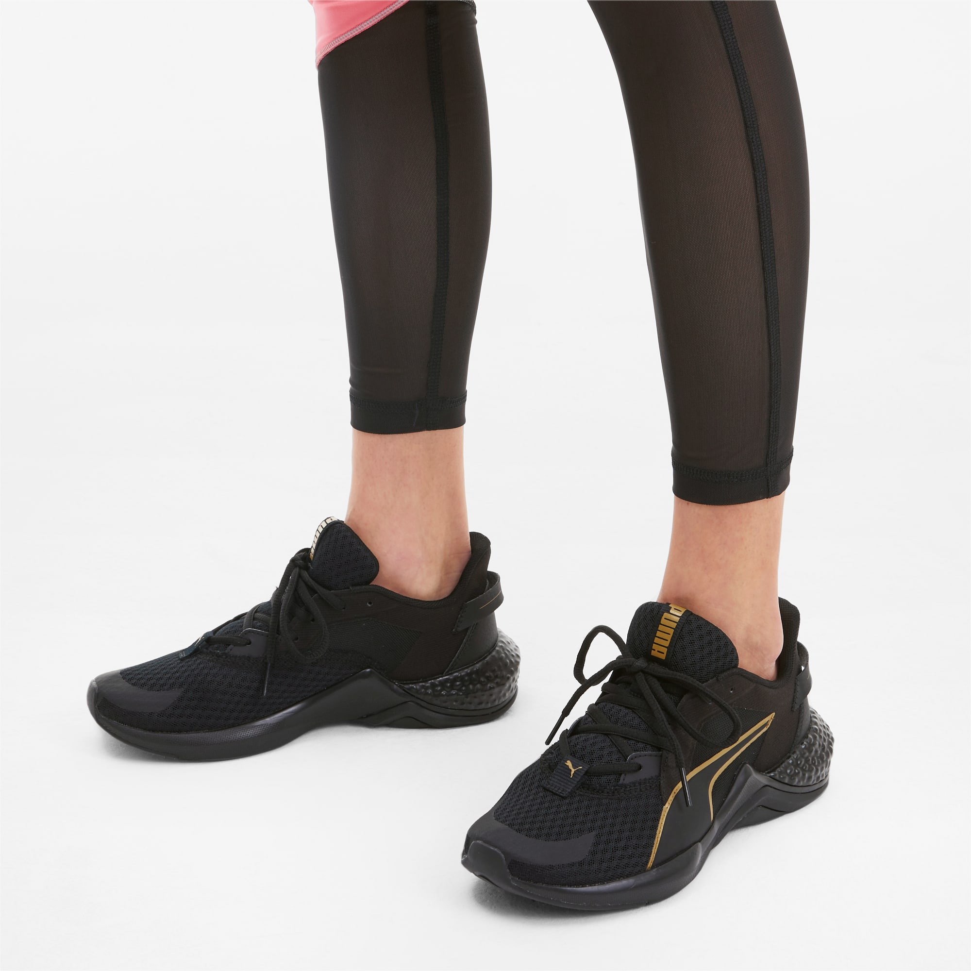 puma black and gold running shoes