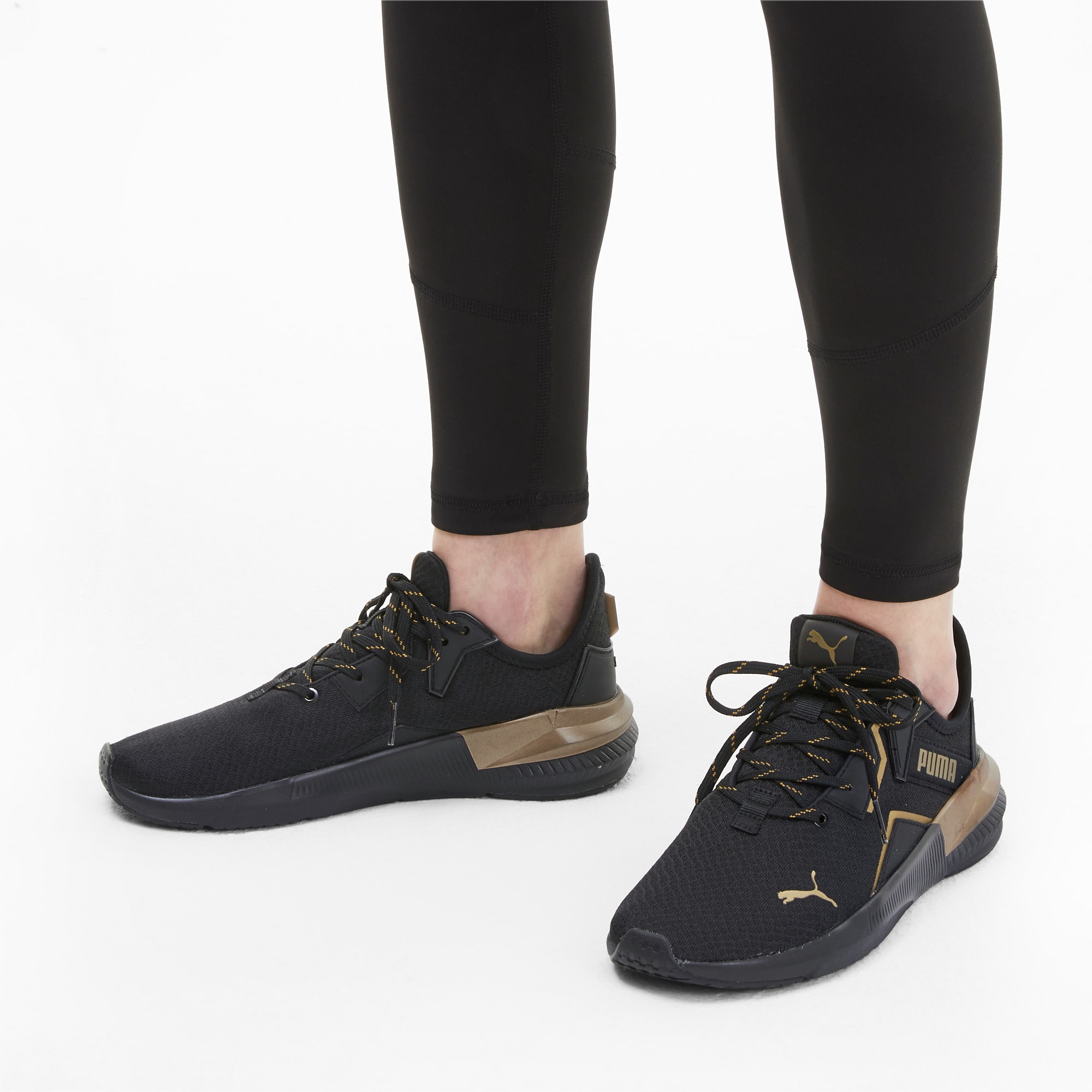 black and gold gym shoes
