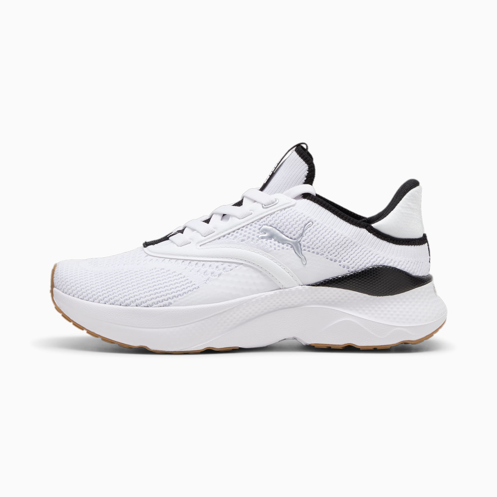 Basket PUMA blanche adulte, dessus en maille, fermeture à lacets et détails noirs.