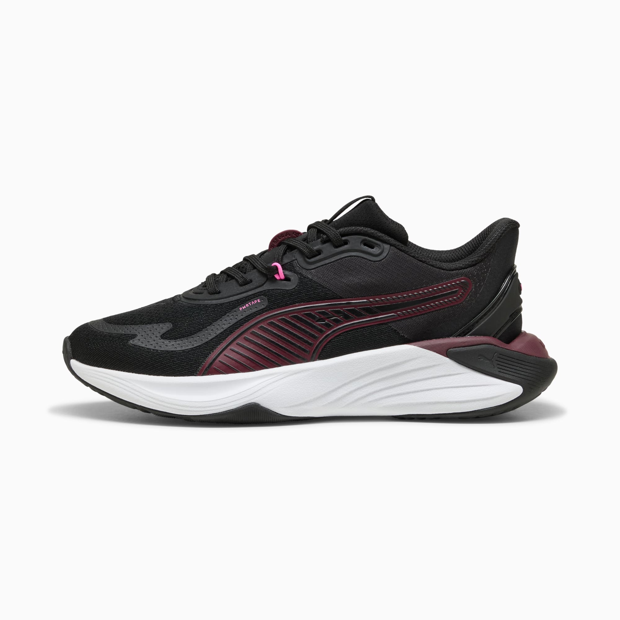 Black PUMA ladies' trainer with burgundy details and a white sole.