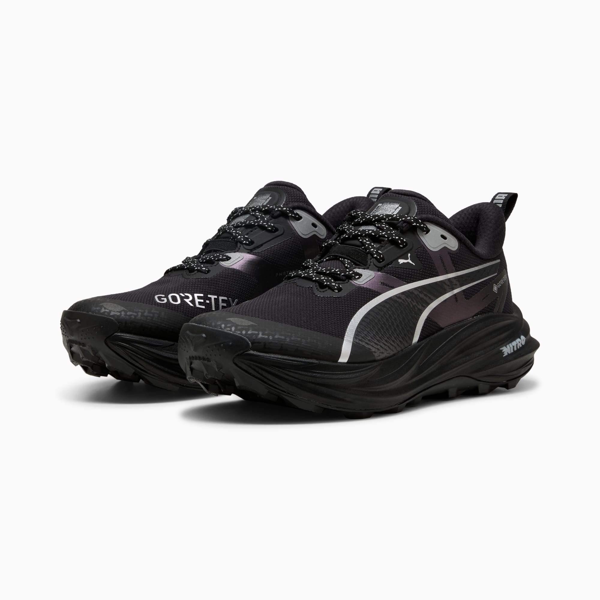 Black PUMA trail running shoes featuring GORE-TEX and the Nitro logo.