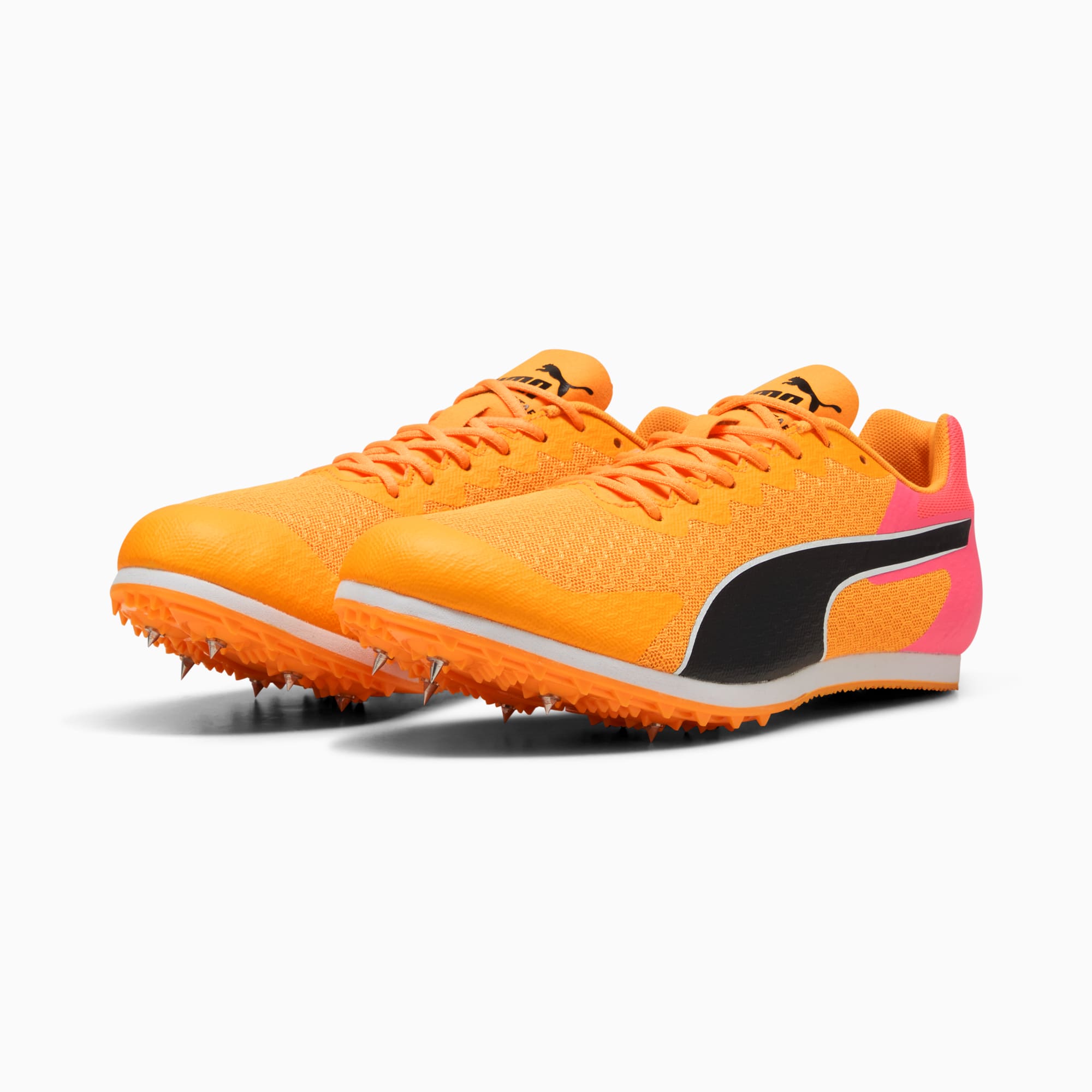 Scarpe da sprint unisex PUMA arancioni con dettagli a chiodi e design formstrip nero.