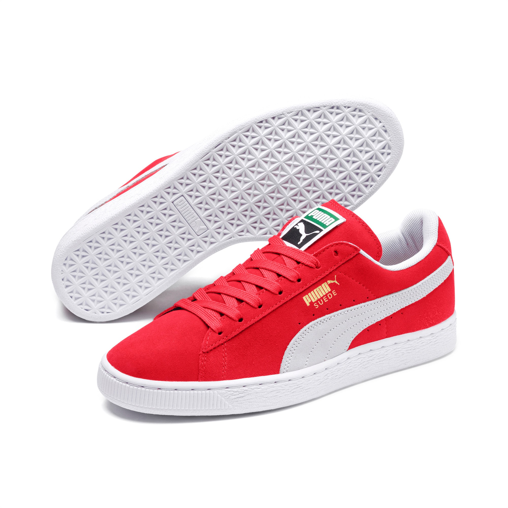 Red and white suede pumas
