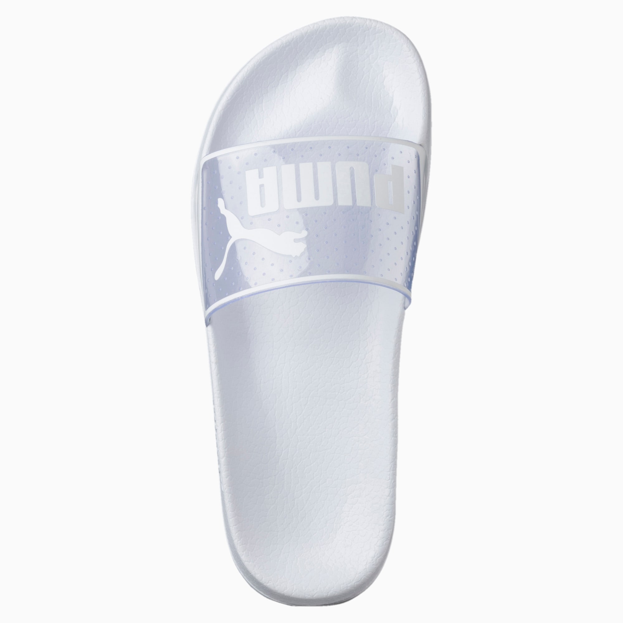 white and clear puma slides