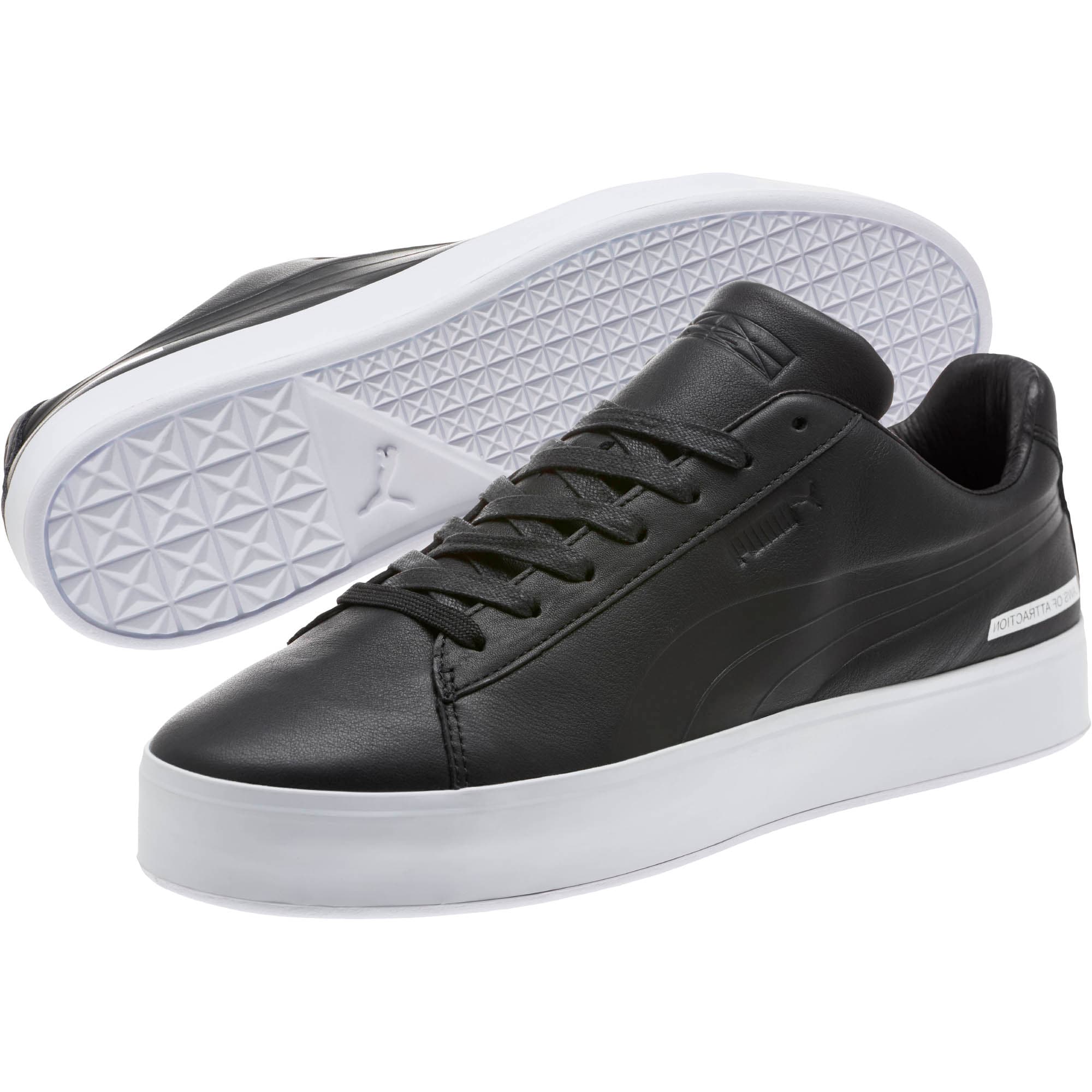 puma white and black platform sneakers