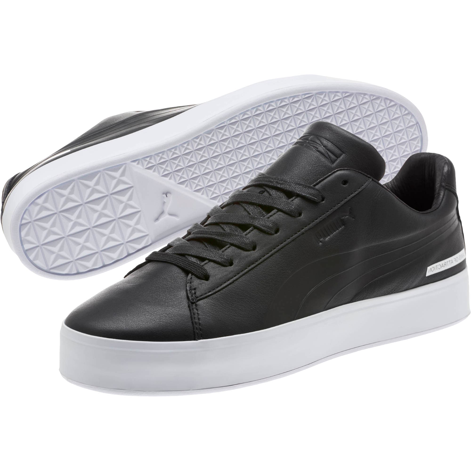 puma black and white shoes