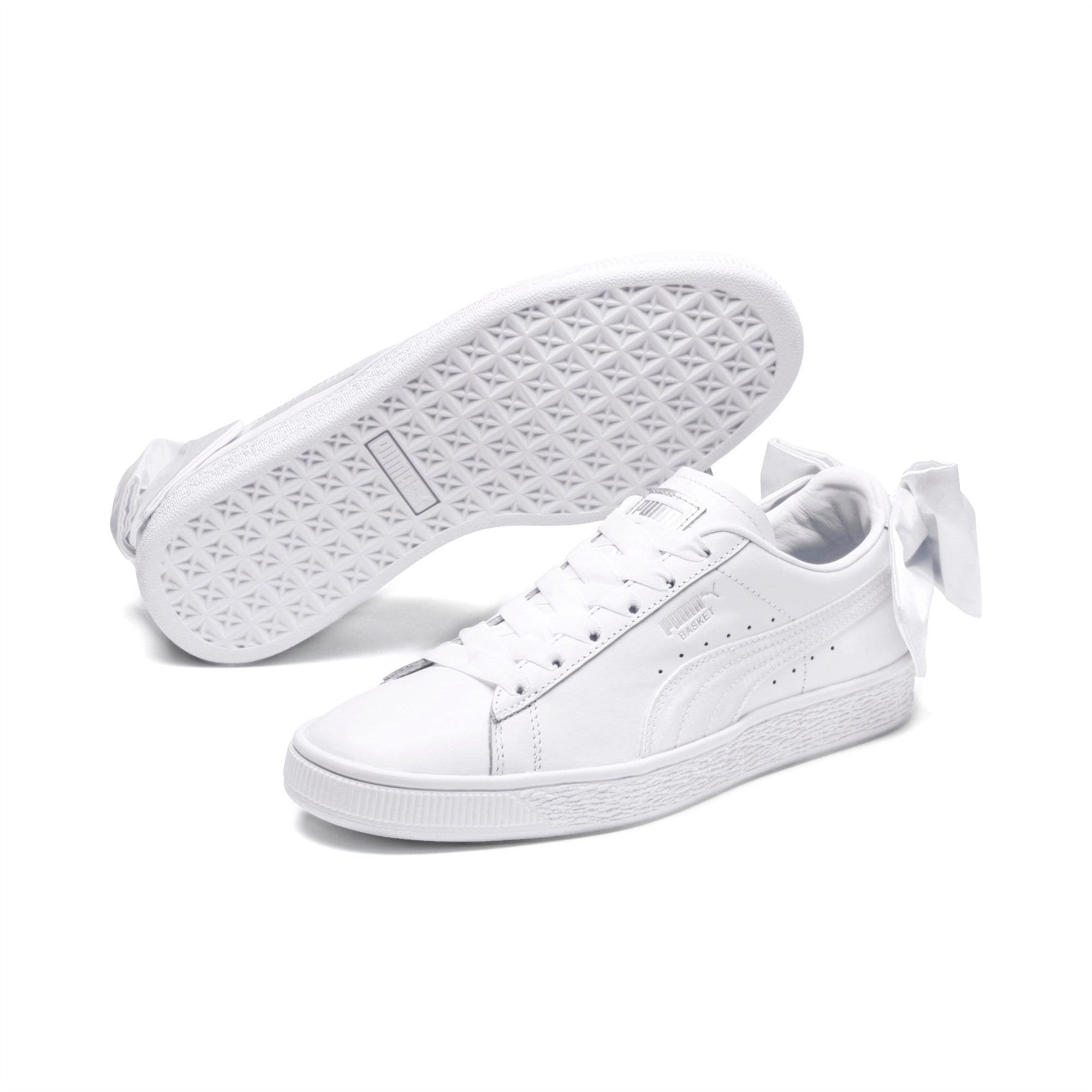 white puma trainers with bow