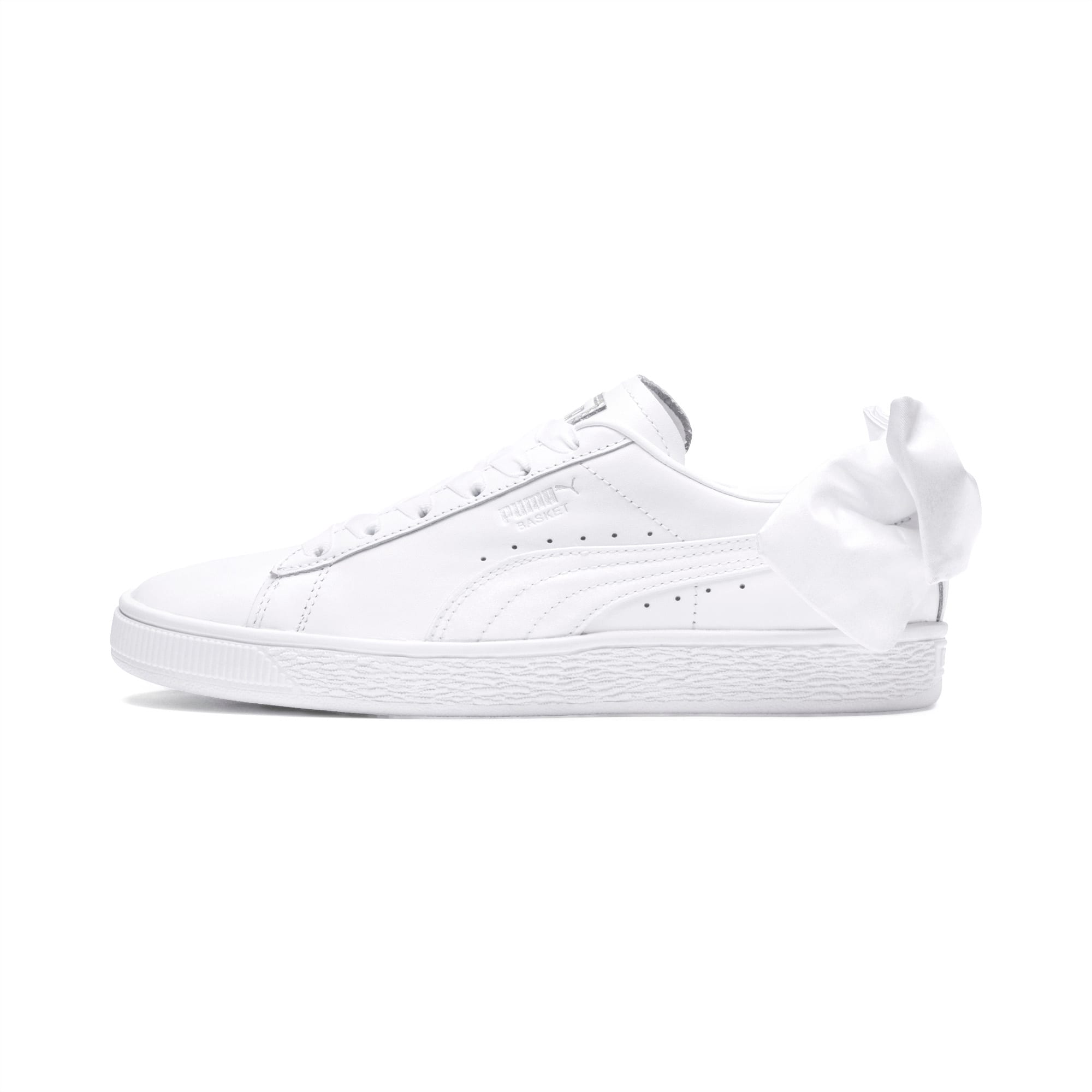 white puma trainers with bow