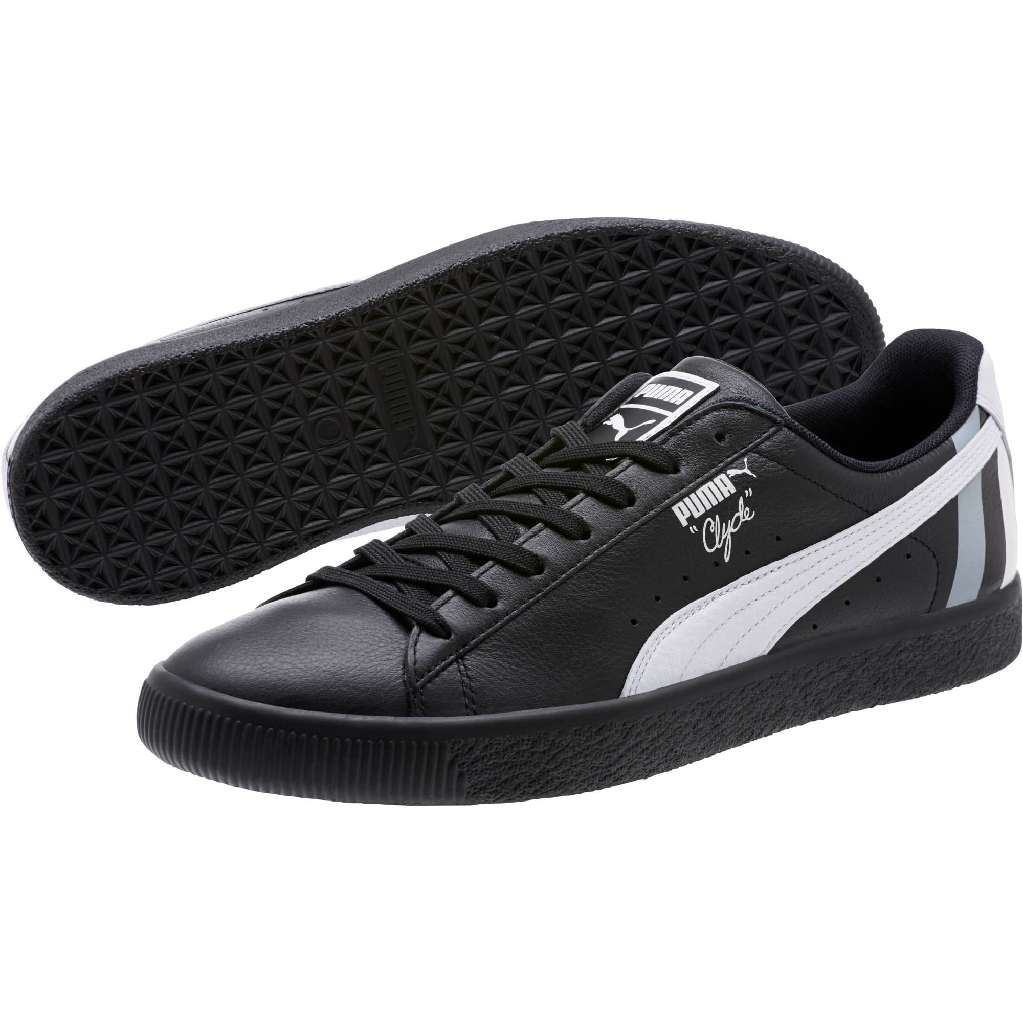 white puma shoes with black stripe