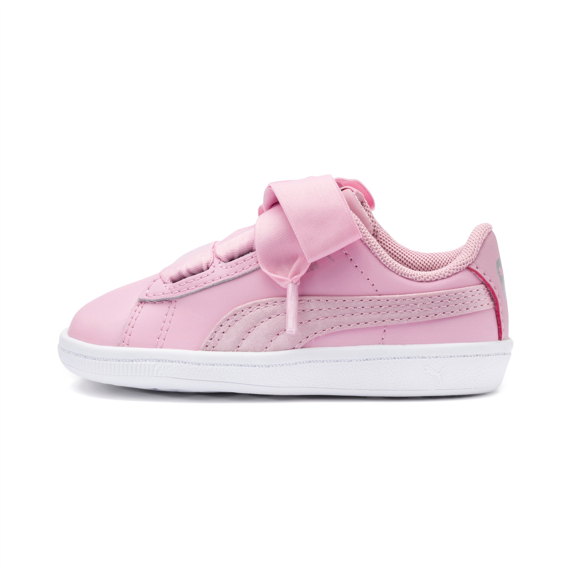 pink pumas with ribbon