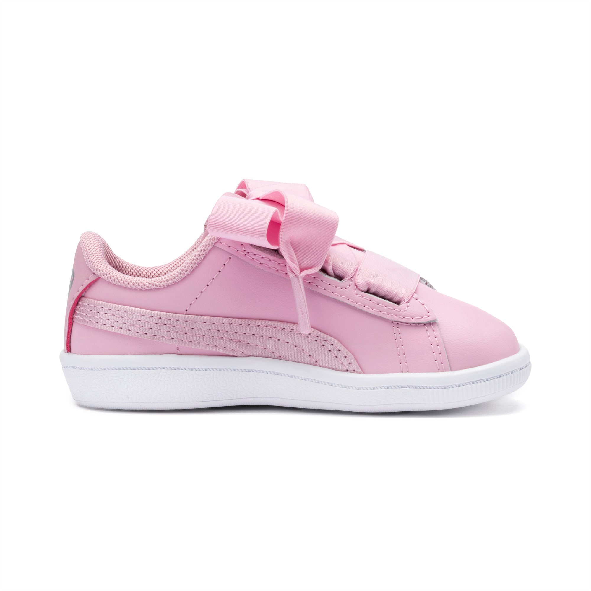 pink pumas with ribbon