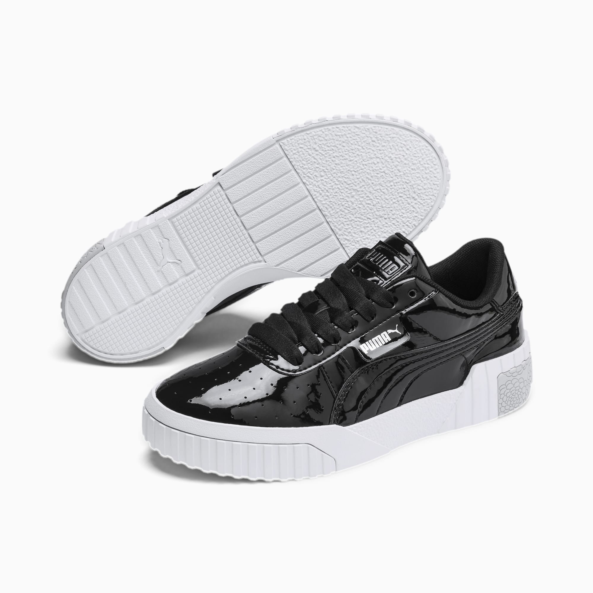 black puma patent trainers