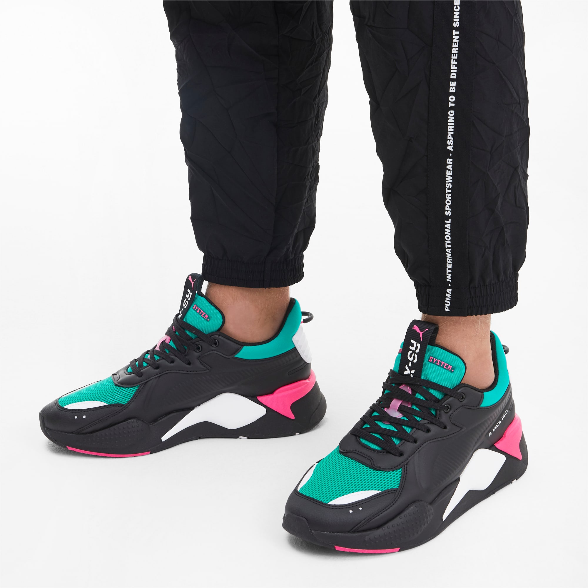 black pink and green pumas