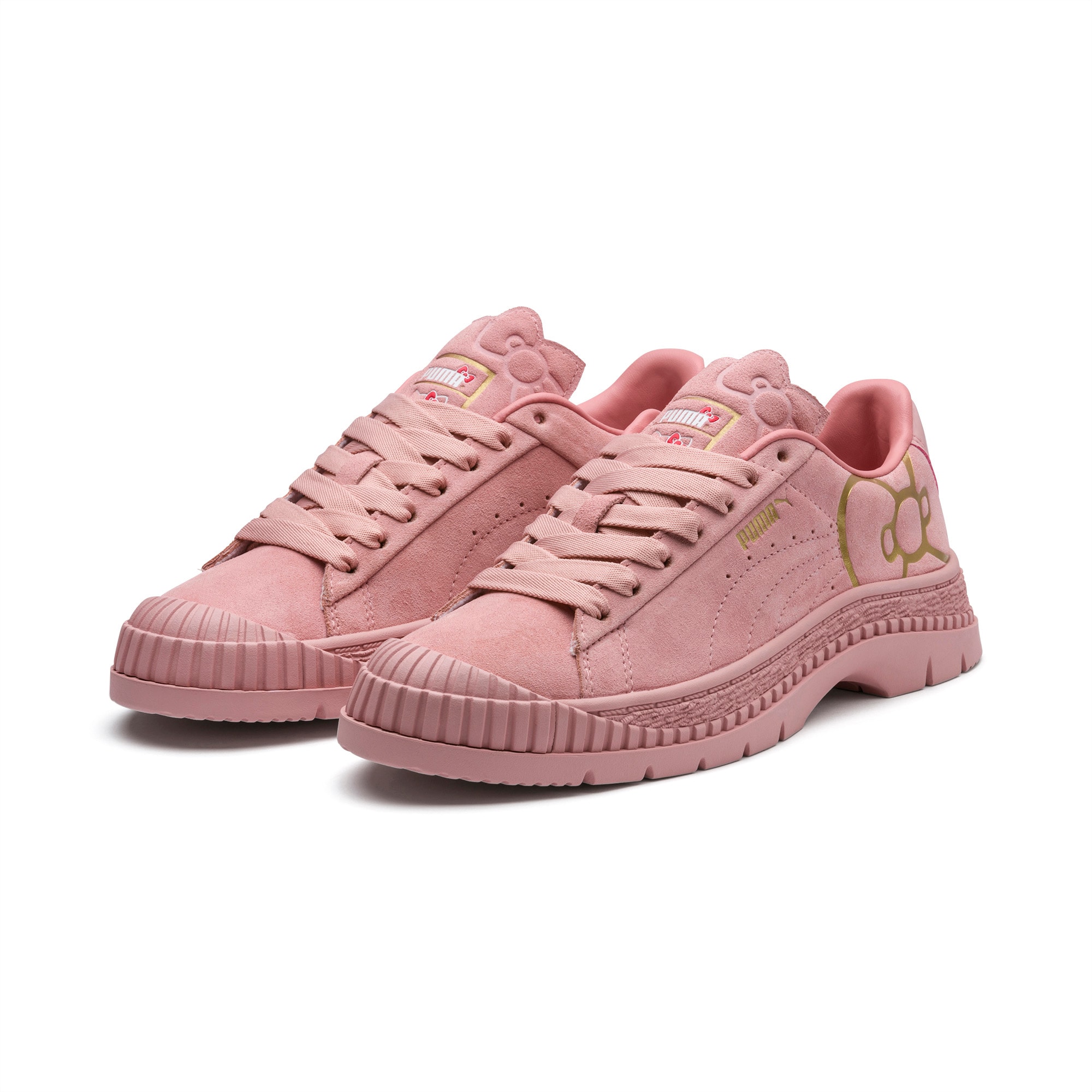 gold and pink pumas