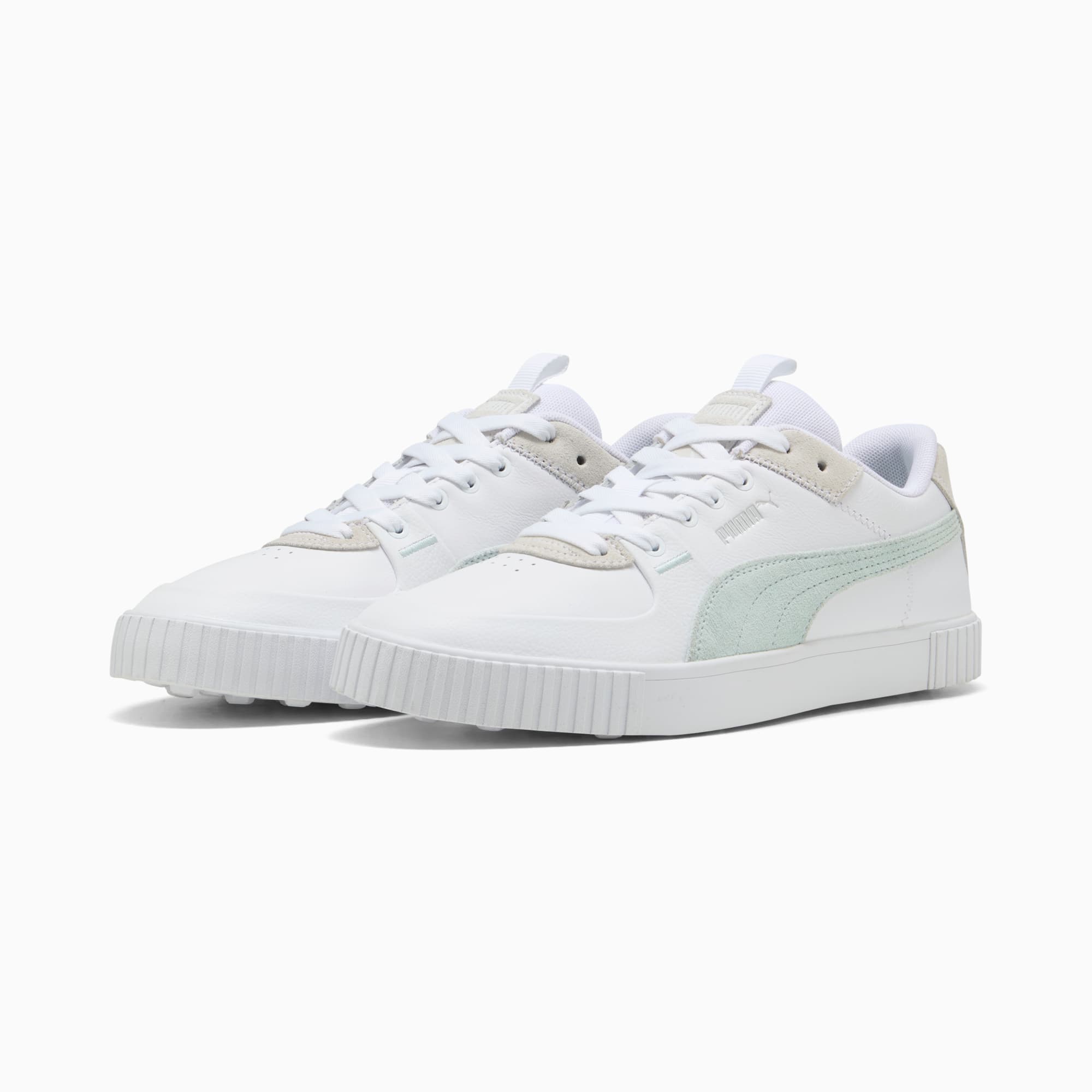 Sneakers PUMA bianche da donna, con striscia verde menta e lacci.