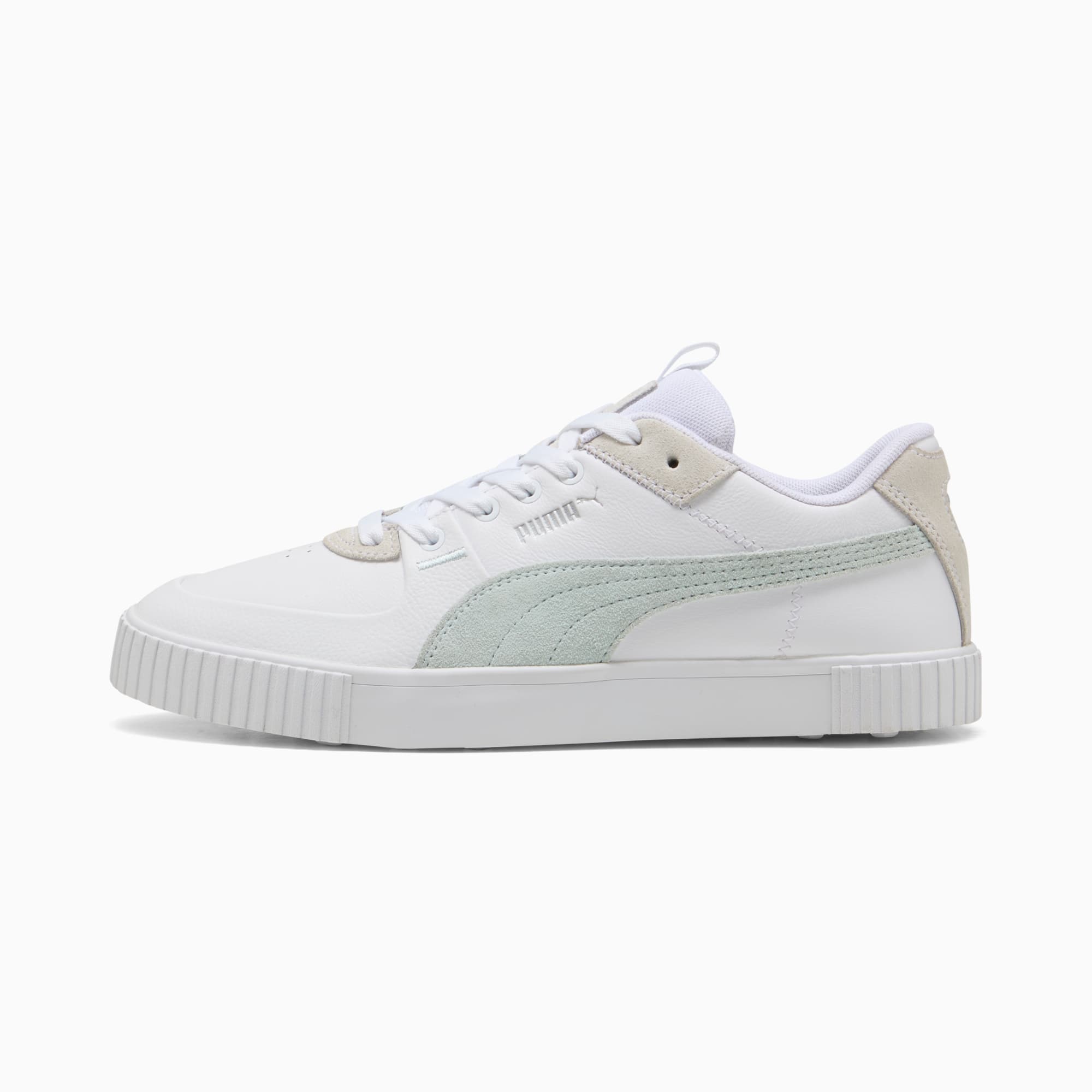 Sneaker PUMA bianca da donna con striscia verde chiaro e suola testurizzata.