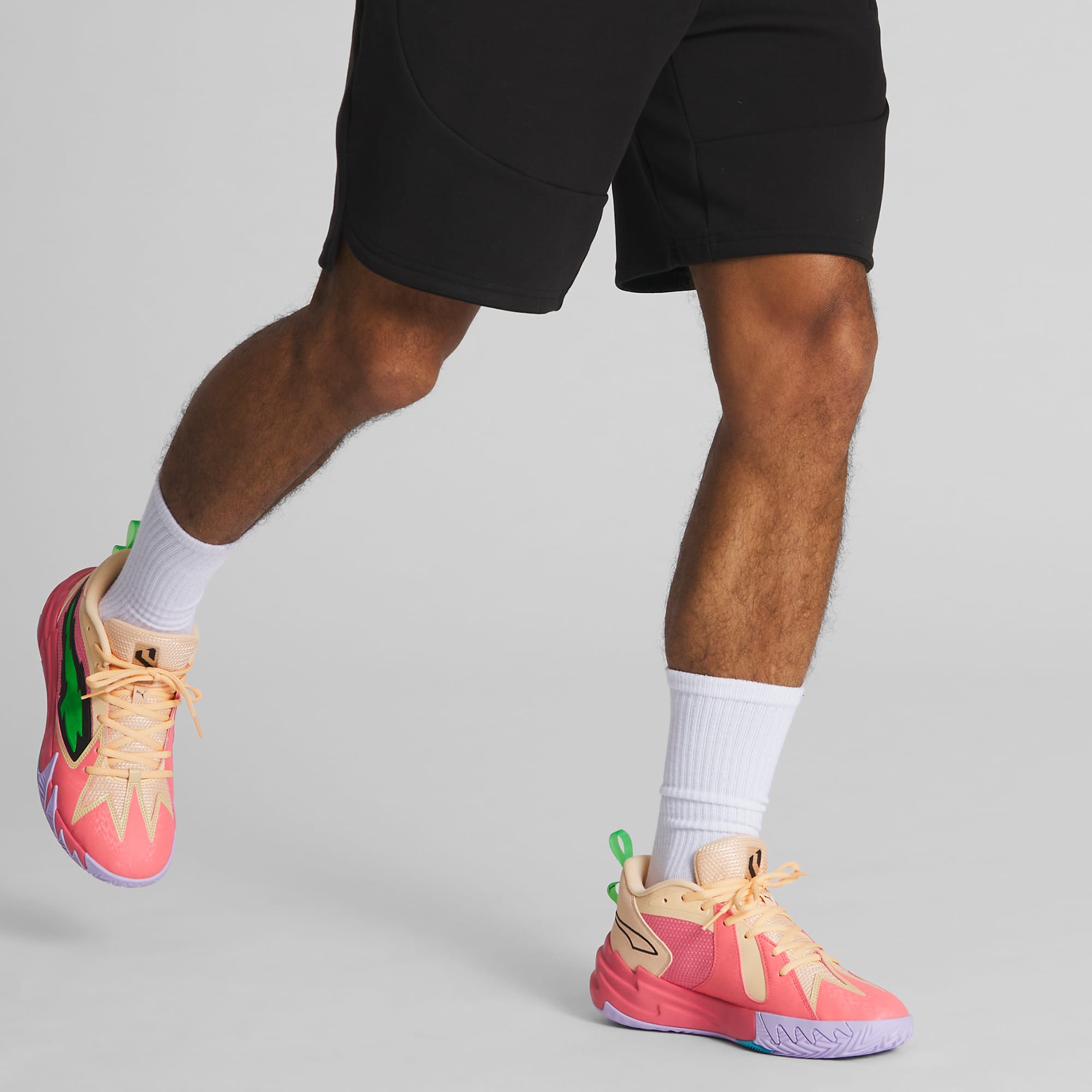 Puma basketball shoes on feet top