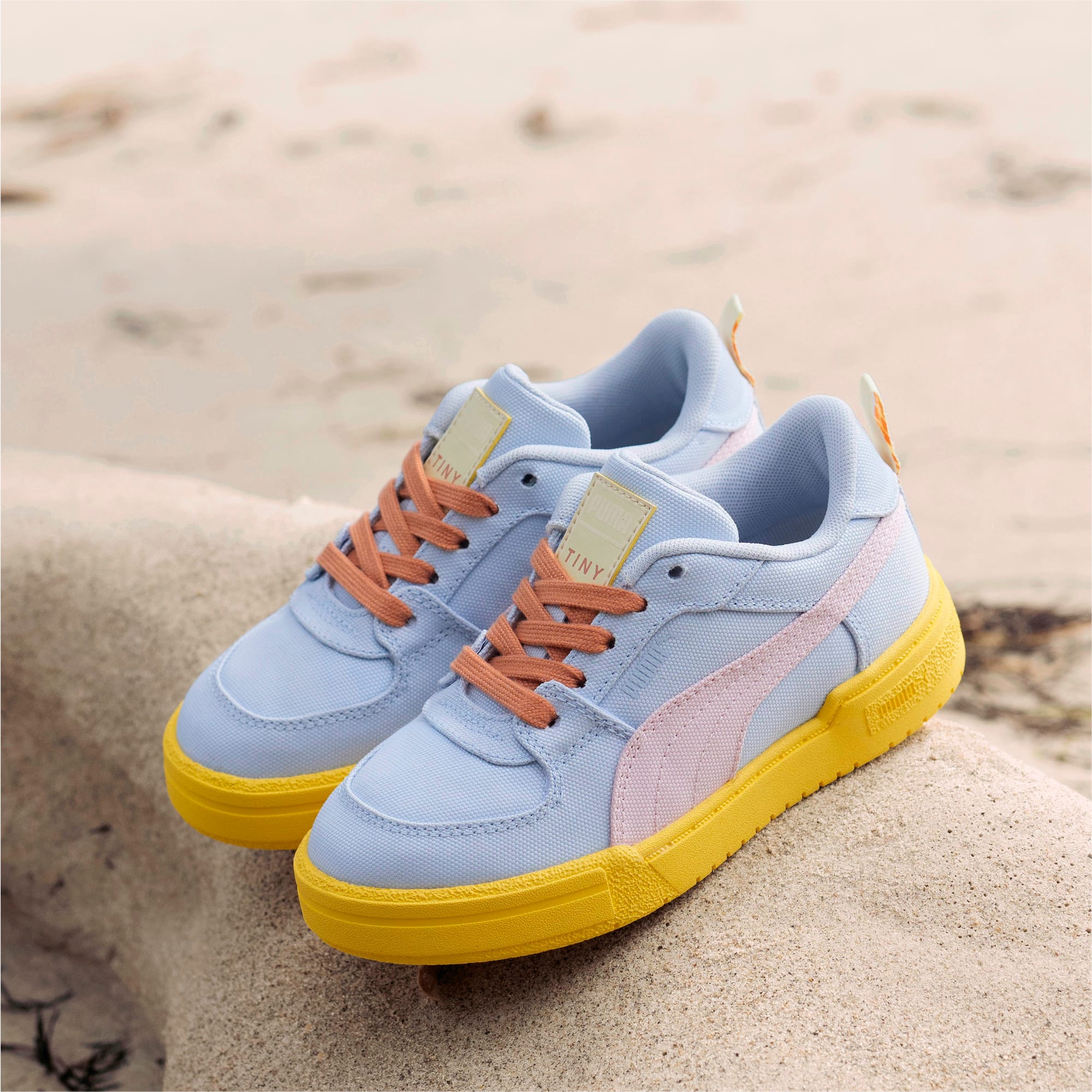 Puma carson runner kids gold sales