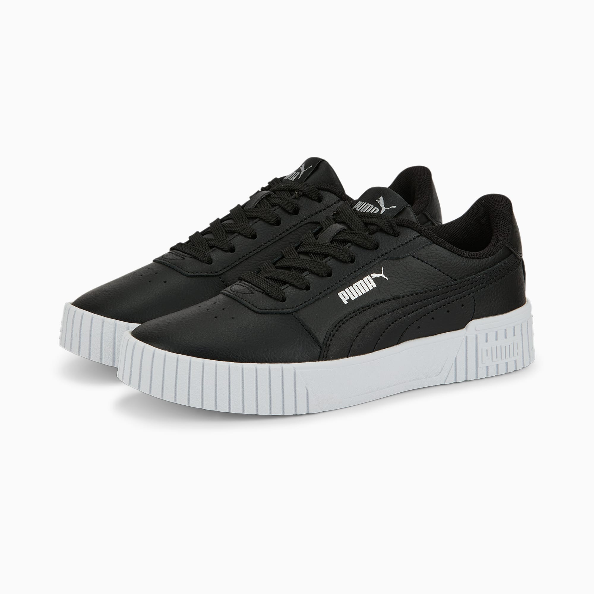 Black PUMA trainer for adults, with lace-up closure and white ridged sole.