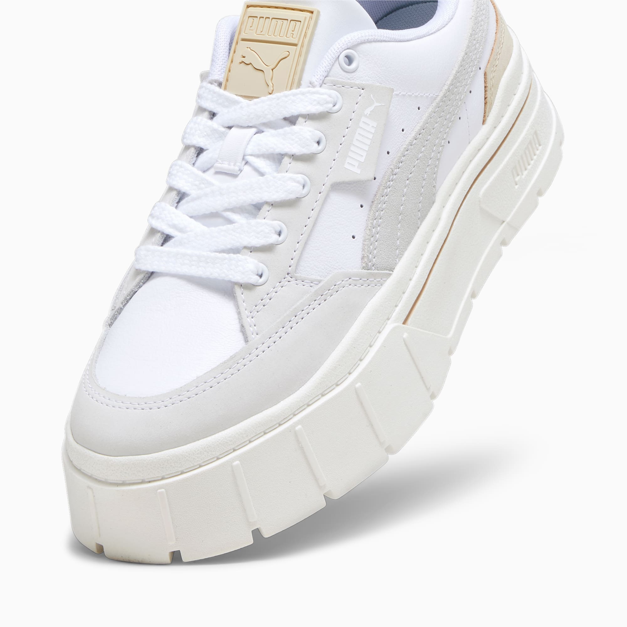 Puma Mayze Stack cord detail sneakers in white and varsity green