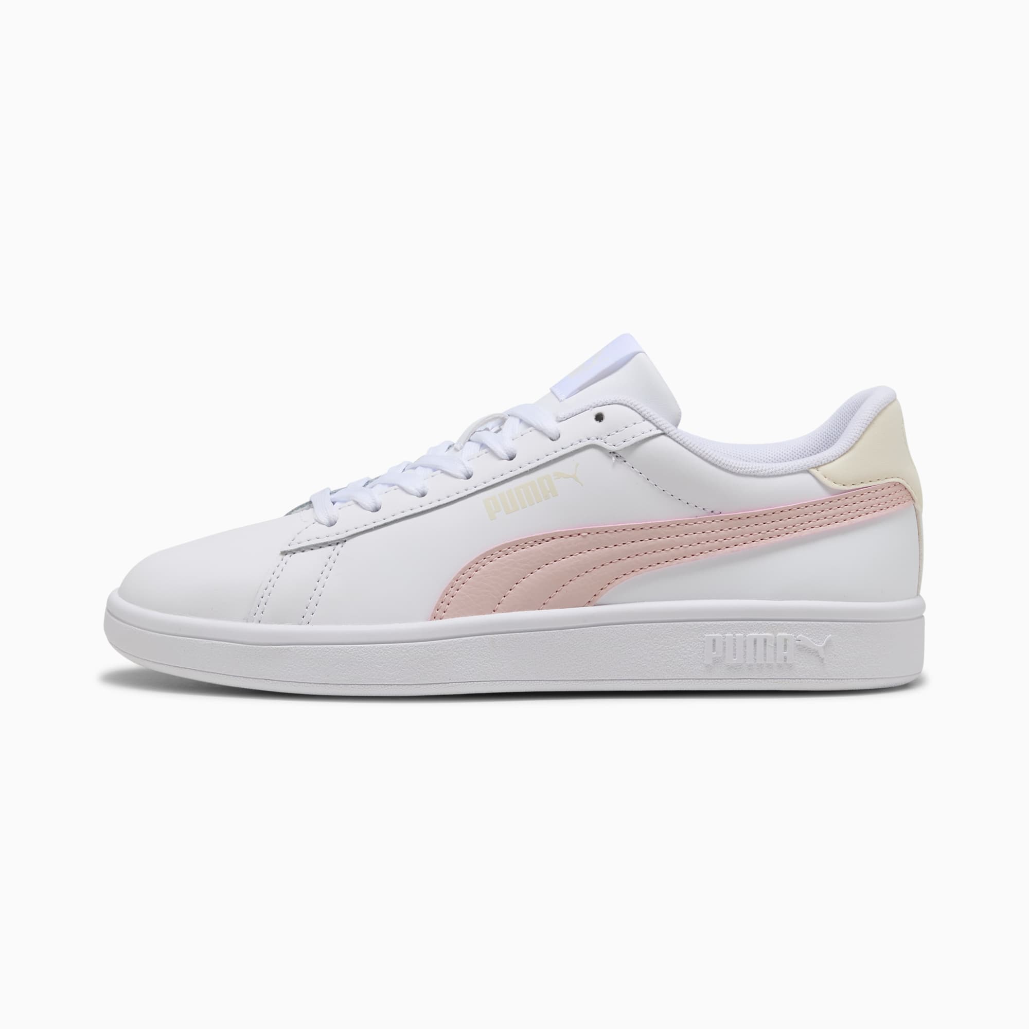 Sneaker PUMA bianca da adulto con striscia rosa e dettaglio panna sul tallone.